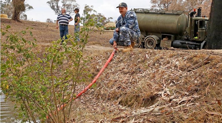 Water flows for grateful farmer - CONTACT magazine