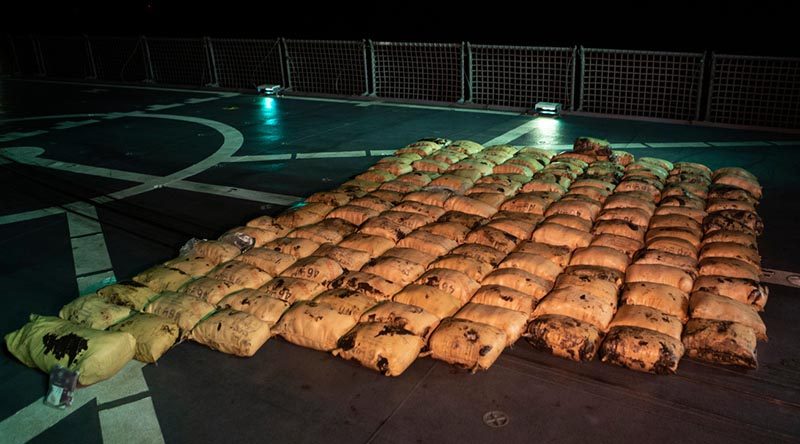 150 parcels of illicit drugs including hashish and heroin are made ready for destruction on the flight deck of HMAS Toowoomba after a successful boarding during Operation Manitou. Photo by Leading Seaman Richard Cordell.