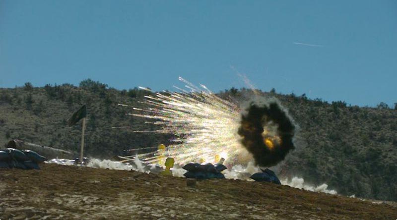 A 30mm airburst cartridge fired from a 30mm Bushmaster chain gun during a test, showcases the system’s ability to defeat man-type targets in defilade positions. Photo supplied by Northrop Grumman.