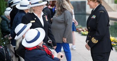 Warrant Officer of the Navy Deb Butterworth, right, speaks with Gaye Doolan, Heather Milward and Judith Rowe from the WRANS - Naval Women’s Association (ACT) at the Australian War Memorial. Story by Acting Sub-Lieutenant Jack Meadows. Photo by Petty Officer Bradley Darvill.