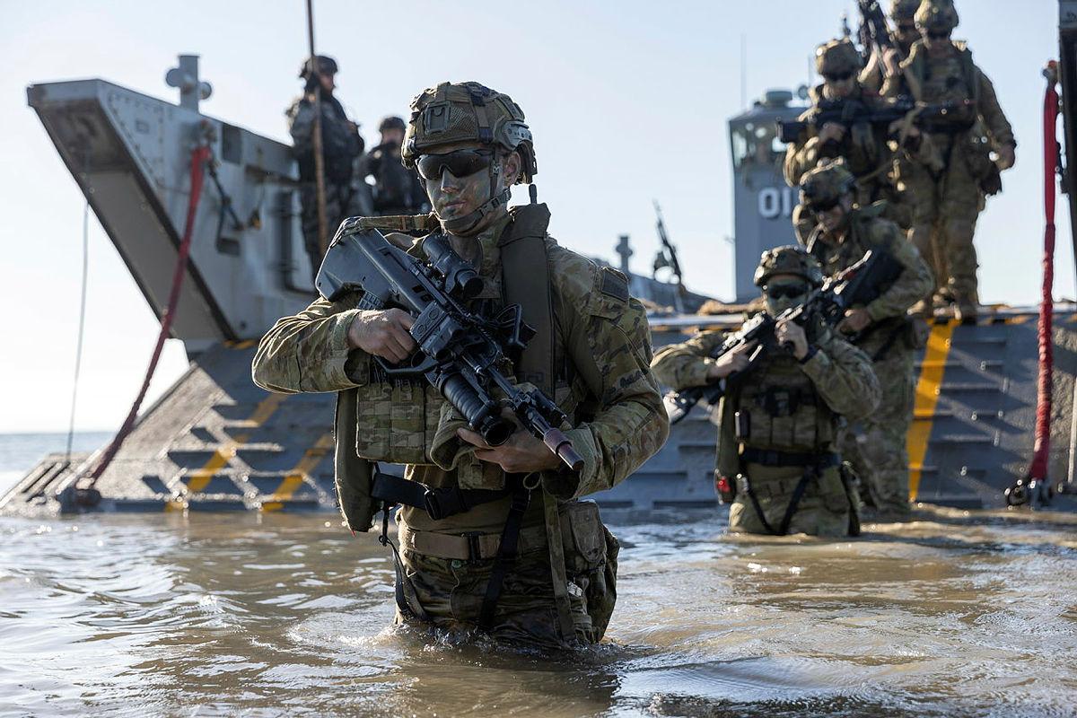 Troops come ashore on quiet beach in final push - CONTACT magazine