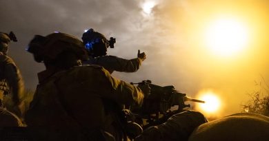 Australian Army soldiers from 1st Battalion, Royal Australian Regiment, fire a 12.7mm Mark 2 machine gun at night at Townsville Field Training Area, Queensland. Photo by Corporal Brandon Grey and Captain Brittany Evans.