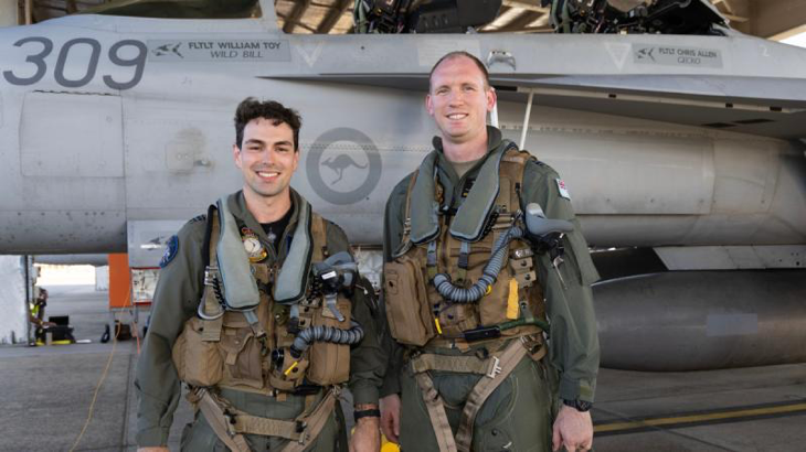 Flight Lieutenant Max, left, and Flight Lieutenant Dallin Stirling, a trainee from 2 Flight Training School, before an incentive flight in an EA-18G Growler at RAAF base Pearce during Exercise Centenarie Redimus. Story by Flying Officer Michael Thomas. Photo by Aircraftman Campbell Latch.