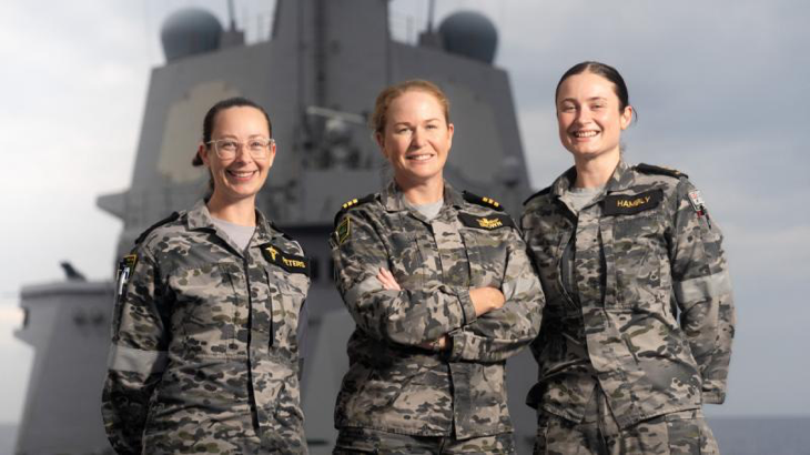 Mothers of HMAS Hobart, from left, Petty Officer Amy Peters, Commander Tina Brown and Leading Seaman Rochelle Hambly on the forecastle as the ship conducts a regional presence deployment. Photo by Leading Seaman Matthew Lyall.