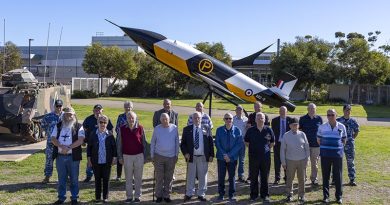 Members of the South Australian branch of the Air Force Association stop in front of a Jindivik target drone at the officers' mess, during a visit to RAAF Base Edinburgh, South Australia. Photo by Leading Aircraftwoman Annika Smit.