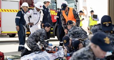 HMAS Stirling and WA emergency services personnel care for simulated casualties during Exercise Vulcan Phoenix 2024 at Fleet Base West, Western Australia. Photo by Leading Seaman Rikki-Lea Phillips.