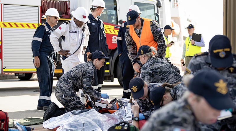 HMAS Stirling and WA emergency services personnel care for simulated casualties during Exercise Vulcan Phoenix 2024 at Fleet Base West, Western Australia. Photo by Leading Seaman Rikki-Lea Phillips.
