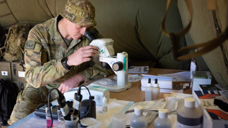 Army environmental health officer Lieutenant Joel Bright, of the 3rd Health Battalion, at his field laboratory during Exercise Rhino Run at Cultana Training Area, South Australia. Story and photo by Sergeant Matthew Bickerton.