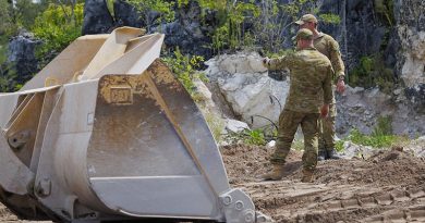 Australian and partner military personnel work on clearing a site to be used to dispose of WWII remnants during Operation Render Safe in Nauru. Photo by Sergeant Craig Barrett.