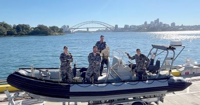 Seaman Riley Moreton, Sub-Lieutenant Nathan Rose, Able Seaman Justin Haynes and Seaman Jamie Jackson in a rigid hull inflatable boat at Fleet Base East after assisting a a distressed kayaker in Sydney Harbour. Photo by Leading Seaman Harry Boardman.