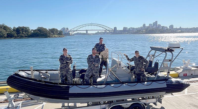 Seaman Riley Moreton, Sub-Lieutenant Nathan Rose, Able Seaman Justin Haynes and Seaman Jamie Jackson in a rigid hull inflatable boat at Fleet Base East after assisting a a distressed kayaker in Sydney Harbour. Photo by Leading Seaman Harry Boardman.