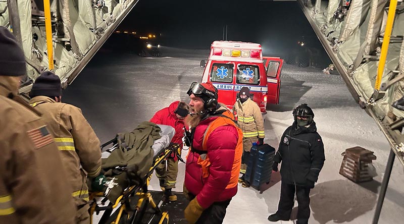 A staff member from the United States’ McMurdo Station in Antarctica is boarded onto a Royal New Zealand Air Force C-130H to be flown to Christchurch for medical treatment. Photo supplied by McMurdo Station staff.