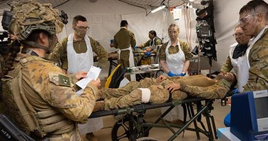 Australian Army medical specialists receive a simulated casualty in the Role 2 Basic resuscitation bay during Exercise Rhino Run at Cultana Training Area. Photo by Sergeant Matthew Bickerton.