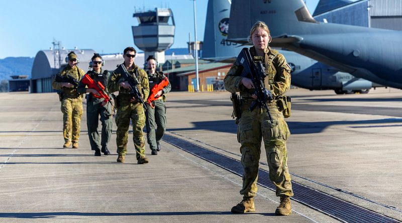 Personnel from 1 Security Forces Squadron, RAAF Base Williamtown, participate in a non-permissive training scenario on the flightline at RAAF Base Richmond. Story by Tastri Murdoch. Photos by Leading Aircraftman Chris Tsakisiris.