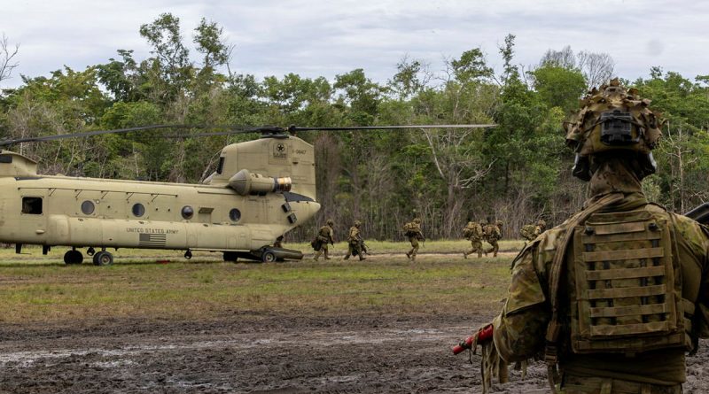 Australian Army soldiers practice offloading from a United States Army Reserve CH-47 Chinook in preparation for an insertion into the Field Training Exercise during Exercise Keris Strike in Sabah, Malaysia. Story and photo by Lieutenant Chloe Reay.