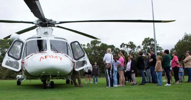 Soldiers from 5th Aviation Regiment present a safety brief to Townsville Hospital Foundation charity 'Brighter Lives' recipients on the Army-leased AW139 helicopter. Story by Captain Tadek Markowski. Photos by Gunner Ryan Kearney.