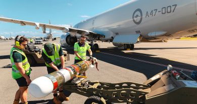 Air Force aviators from 11 Squadron transfer a Mk54 Lightweight exercise torpedo to a RAAF P-8A Poseidon during Exercise Rim of the Pacific 2024, at Joint Base Pearl Harbor-Hickam, Hawaii. Story by Lieutenant Carolyn Martin. Photos by Corporal Adam Abela.