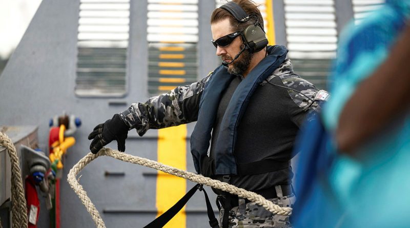 Able Seaman Clint Selwood handles lines on HMAS Choules’ embarked light landing craft in Suva, Fiji, as part of a south-west Pacific regional presence deployment. Story by Lieutenant Marie Davies. Photos by Leading Seaman Matthew Lyall.