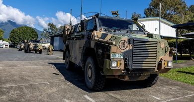 Soldiers from 11th Brigade move out from Porton Barracks in Cairns in their Bushmaster protected mobility vehicles at the start of Exercise Austral Shield. Story by Captain Andrew Lee. Photo by Corporal Michael Currie.