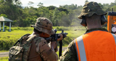 An Australian soldier from Rifle Company Butterworth 144 gives feedback to a soldier from the US Army during close combat shooting drills as part of Exercise Keris Strike in Malaysia. Story and photo by Lieutenant Chloe Reay.