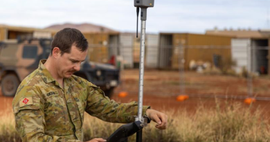 Australian Army surveyor Sapper Shaun Jackson from 6th Engineer Support Regiment completes a surveying task as part of the 2024 Army Aboriginal Community Assistance Programme in Amata, SA. Story by Flight Lieutenant Marina Power. Photo by Private Jack Hayes.