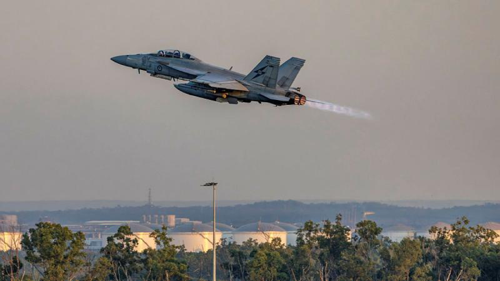 A RAAF FA-18F Super Hornet aircraft departs RAAF Base Darwin for a night flying mission as part of Exercise Pitch Black 2024. Story by Flight Lieutenant Imogen Lunny. Photo by Leading Aircraftwoman Annika Smit.