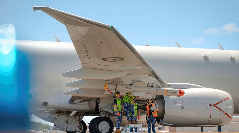 Air Force aviators from 11 Squadron fit an AGM-84J harpoon anti-ship missile to a RAAF P-8A Poseidon as part of Exercise Rim of the Pacific (RIMPAC), held in the Hawaiian Islands. Story by Lieutenant Carolyn Martin. Photos by Corporal Adam Abela.