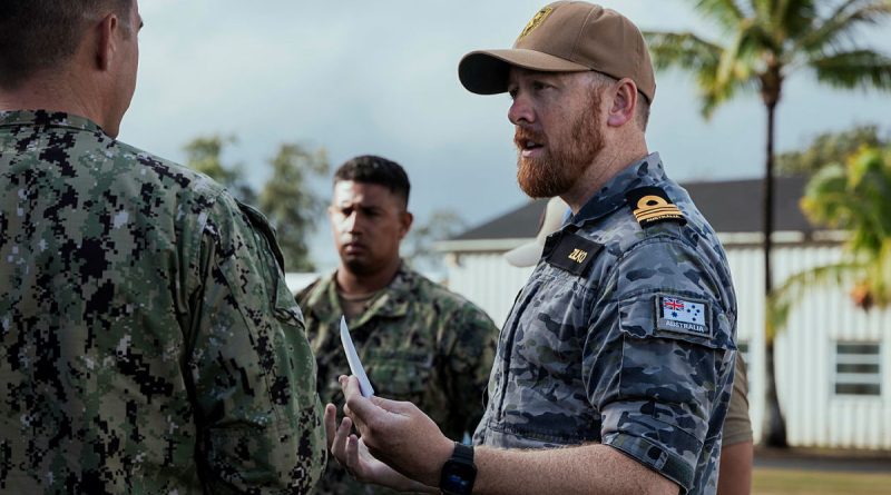 Royal Australian Navy mine warfare clearance diving officer Lieutenant Commander Adam Zilko, participates in a brief for mine countermeasures as a part of Exercise Rim of the Pacific (RIMPAC) 24 in Hawaii. Story by Lieutenant Carolyn Martin. Photos by Corporal Nicole Dorrett.