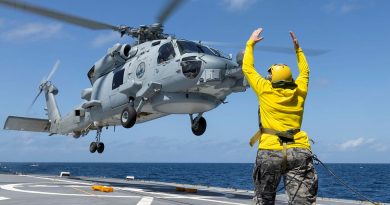 Leading Seaman Aviation Technician Airframe Prudence Harper, of 808 Squadron, conducts a flying exercise with HMAS Perth’s MH-60R aircraft 'Siren' during a regional presence deployment. Story by Lieutenant Commander Andrew Herring. Photos by Leading Seaman Ernesto Sanchez.