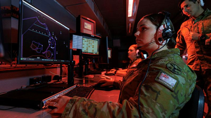 Air surveillance operator Corporal Mikayla Dows, of 114 Mobile Control and Reporting Unit, monitors the air space inside the Mobile Control Reporting Centre during Exercise Pitch Black 24. Story by Flight Lieutenant Matthew Edwards. Photo by Sergeant David Gibbs.