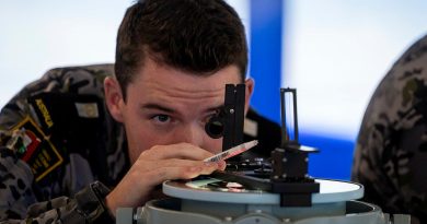 Midshipman Xavier Ryan takes a bearing fix in one of the new bridge simulators located at Defence Establishment Berrimah, Darwin. Story by Richard Wilkins. Photos by Petty Officer Leo Baumgartner.