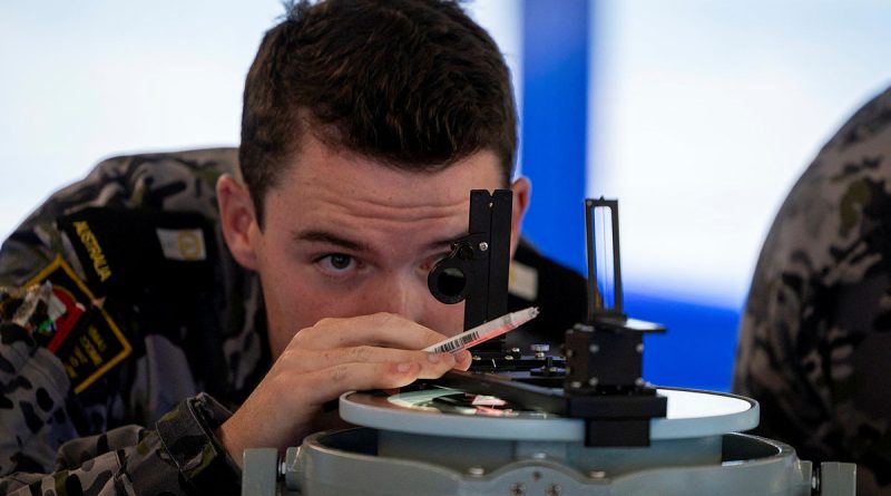 Midshipman Xavier Ryan takes a bearing fix in one of the new bridge simulators located at Defence Establishment Berrimah, Darwin. Story by Richard Wilkins. Photos by Petty Officer Leo Baumgartner.