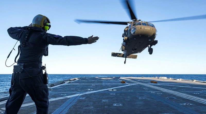 An Army UH-60M Black Hawk conducts deck landings during first-of-class flight trials on board Navy’s multi-role aviation training vessel MV Sycamore in Jervis Bay. Story by Major Cameron Jamieson. Photos by Private Alex Brown.