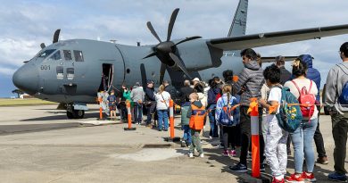 Members of the public line up to receive a tour onboard the C-27J Spartan during the RAAF Base Point Cook open day, Victoria. Story by Flying Officer Rose Gigliotti. Photos by Aircraftwoman Mikaela Fernlund.