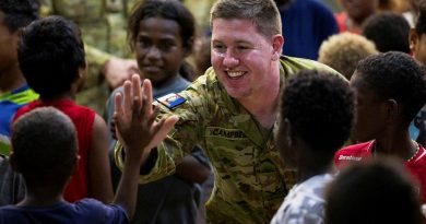 Army personnel attend church with local children during Operation Render Safe, Noro, Solomon Islands. Story by Sergeant David Said. Photos by Corporal Sam Price.