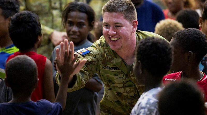 Army personnel attend church with local children during Operation Render Safe, Noro, Solomon Islands. Story by Sergeant David Said. Photos by Corporal Sam Price.