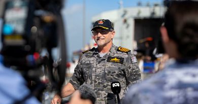 Navy officer Captain Dave Tietzel, the Exercise Director for Exercise Kakadu 2024, addresses the media during a media doorstop at HMAS Coonawarra, NT. Story by Flying Officer Shanea Zeegers. Photos by Leading Aircraftwoman Aiesha White-Kratz.