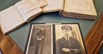 Photos of Lieutenant McWilliam, foreground right, and Captain McWilliam, foreground left; his diary, back left, and his midshipman’s journal, back right. Story and photo by Lieutenant Commander John Thompson.