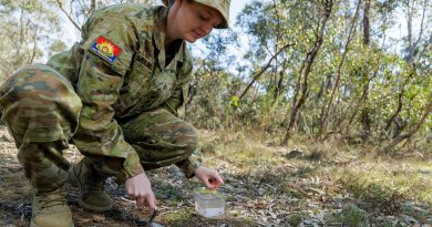 Army officer Captain Alison Mountain, of the Unrecovered War Casualties – Army Unit, tests some samples of soil in Canberra, ACT. Story. by Flight Lieutenant Marina Power. Photos by Corporal Cameron Pegg.