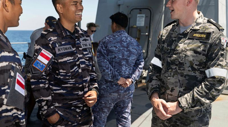 Indonesian Military Police Sergeant Joni Nyoman with Midshipman Joshua Breedon on the upper deck of HMAS Warramunga during Exercise Kakadu 24. Story by Lieutenant Marie Davies. Photos by Leading Seaman Iggy Roberts.