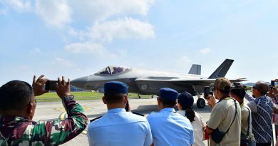 Indonesian military personnel and members of the public watch as an RAAF F-35A Lightning II starts up for a flying display at the Bali International Air Show. Story. y Squadron Leader Eamon Hamilton. Photo supplied by Indonesian Air Force Information Service.