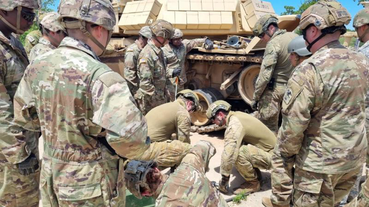 Australian sappers from 3rd Combat Engineer Regiment and the School of Armour learn maintenance and operation of the armoured breaching vehicle during the Combat Engineer Heavy Track Course in Missouri. Story by Corporal Jacob Joseph.