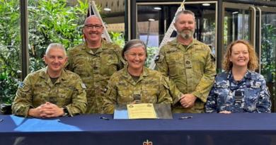 Group Captain Gary Sadler, Warrant Officer Jason Pyke, Group Captain Kylie Green, Warrant Officer Korey McGregor and Wing Commander Fiona Pearce following the 17 Squadron handover/takeover ceremony. Story by Scott Jenner.