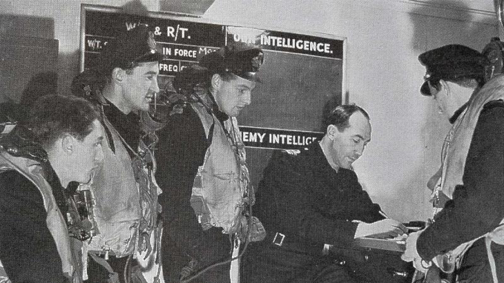 Admiral Victor Smith, seated, as air operations officer on board HMS Tracker operating in the Atlantic and Arctic in 1943. Story by Corporal Luke Bellman. Photos courtesy Fleet Air Arm Association of Australia.