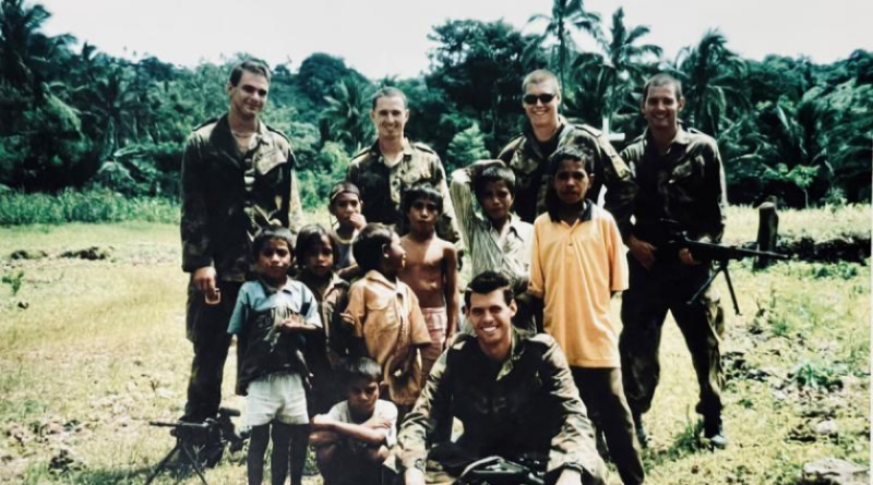 Then Flying Officer Harvey Reynolds, second from left, during his INTERFET deployment with 2 Airfield Defence Squadron on a routine patrol of Atauro Island, East Timor. Story by John Noble.