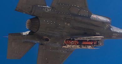 A Joint Strike Missile (orange) loaded in an internal weapon's bay of a US Air Force F-35 Joint Strike Fighter during test and evaluation trials. Image supplied by Kongsberg to the ADF for distribution to media.