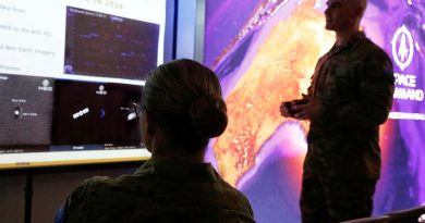 Army's Major Thomas Bittner briefs ADF Chief of Joint Capabilities Lieutenant General Susan Coyle in the Air Force Space Command Operations Centre during Exercise Pitch Black this year. Story by Ricky Bryan. Photo by Sergeant Andrew Eddie.