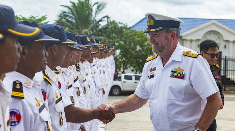 Commander IPE24 Commodore Michael Harris greets officials from the Royal Cambodian Armed Forces at the Ream Naval Base during HMAS Perth's visit to Sihanoukville, Cambodia. Story by Lieutenant Commander Natalie Stafford. Photos by Leading Seaman Ernesto Sanchez.