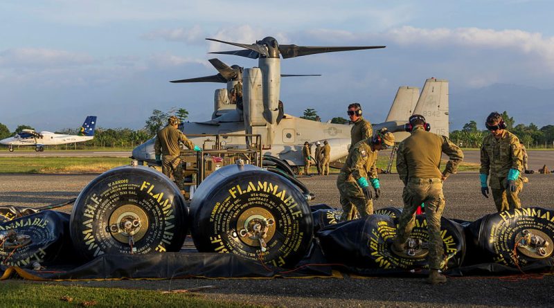 Australian Army soldiers refuel a US Marine Corps MV-22 Osprey at a refuelling point aviation during Operation Render Safe, Honiara, Solomon Islands. Story by Sergeant David Said. Photos by Corporal Sam Price.