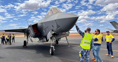 Aircraftman Nicholas Thorpe, of 25 Squadron, and Squadron Leader James Wheeler, of 3 Squadron, speak with Eliwana mine staff during a visit to Eliwana airport in the Pilbara region of WA. Story and photos by Stephanie Hallen.